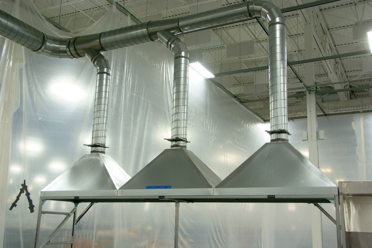 Table Hood Hoods Installed at Woodward Inc.
